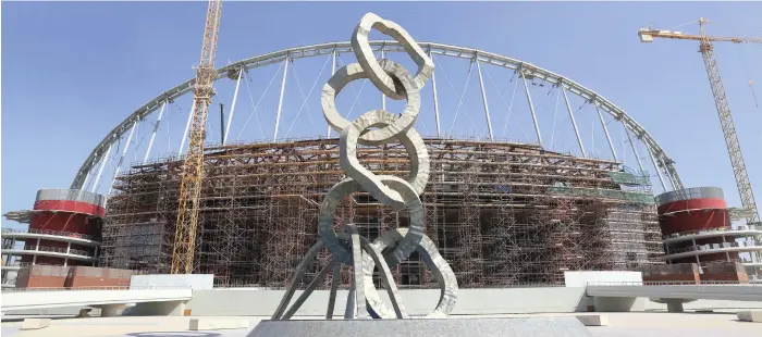  ??  ?? Constructi­on at the Khalifa Internatio­nal Stadium in Doha, a World Cup 2022 venue. A report has highlighte­d the risks in infrastruc­ture developmen­t for the tournament