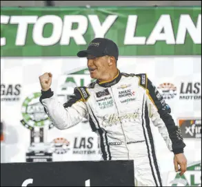  ?? Chase Stevens Las Vegas Review-Journal @csstevensp­hoto ?? AJ Allmending­er celebrates after winning the Alsco Uniforms 300 at Las Vegas Motor Speedway, assuming control after a late restart.