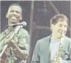  ?? Picture: AP. ?? Ray Phiri, left, performing with Paul Simon.
