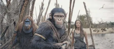  ?? 20TH CENTURY STUDIOS PHOTOS ?? On his mission to find survivors of an attack on his clan, Noa (center, played with CGI capture by Owen Teague) is joined by orangutan elder Raka (Peter Macon) and feral human Mae (Frey Allan) in “Kingdom of the Planet of the Apes.”