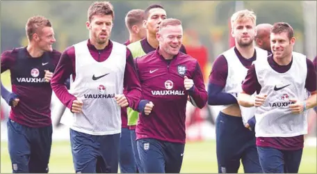  ??  ?? Wayne Rooney (3rd right) leading the Three Lions training at the ongoing Euro2016 in France