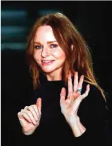  ??  ?? British fashion designer Stella McCartney waves after her Fall-Winter 2017/2018 ready-to-wear collection presented in Paris.