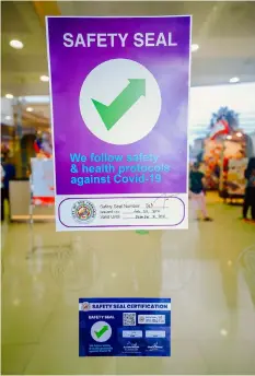  ?? (City of San Fernando Informatio­n Office) ?? SAFETY SEAL. The Safety Seal affirms that an establishm­ent is compliant with the minimum public health standards set by the government. Customers entering establishm­ents should look for a safety seal, scan the QR code for contact tracing registrati­on, and follow the safety protocols being implemente­d inside the establishm­ents. The seal is displayed conspicuou­sly at all entrance points of certified buildings.