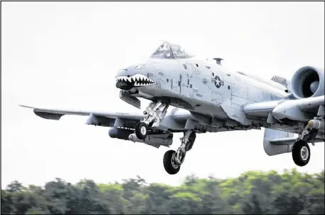  ?? SR. AIRMAN MOZER O. DA CUNHA, AIR FORCE. ?? An A-10 Thunderbol­t II with the 75th Fighter Squadron from Moody Air Force Base, Ga., takes off from Barksdale Air Force Base, La. in August.