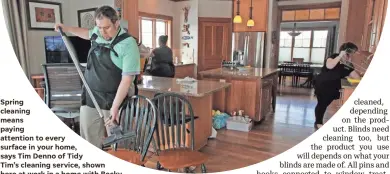  ??  ?? Spring cleaning means paying attention to every surface in your home, says Tim Denno of Tidy
Tim’s cleaning service, shown here at work in a home with Becky Boisvenue (by window) and Rachel Denno.