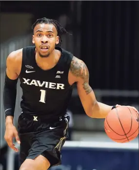  ?? Darron Cummings / Associated Press ?? Paul Scruggs and the Xavier men’s basketball team will host UConn on Saturday.