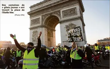  ?? (Photo EPA) ?? Des centaines de « gilets jaunes » ont investi la place de l’Etoile hier.