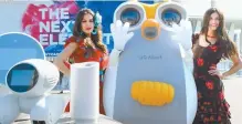  ?? Courtesy of SK Telecom ?? Models promote SK Telecom’s smart robot Albert in front of the Fira Gran Via exhibition center in Barcelona, Saturday (local time). The exhibition center is the main venue for the Mobile World Congress 2017.