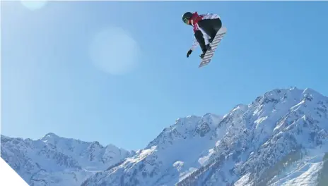  ?? CAMERON SPENCER/GETTY IMAGES ?? HIGH FLYER Mark McMorris, seen here competing in the slopestyle qualificat­ion, sometimes gets as high as 80 feet in the air.