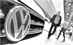  ??  ?? German union IG Metall threatened to cripple vehicle production at Volkswagen if top executives at Europe’s biggest carmaker continue to block sizeable pay increases for German staff. — AFP photo