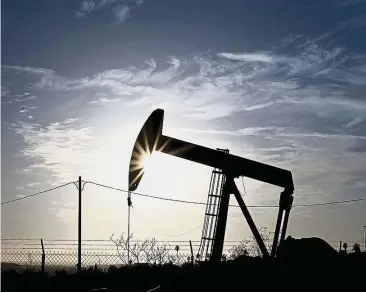  ??  ?? Uptrend: A pumpjack operates at the Inglewood oilfield in Los Angeles, California. Global benchmark Brent crude topped US$60 a barrel last month for the first time since July 2015, while West Texas Intermedia­te, the US marker, is set for the highest...