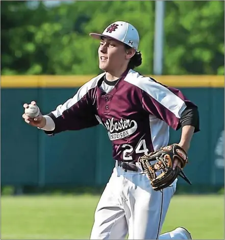  ?? PETE BANNAN — MEDIANEWS GROUP FILE ?? West Chester Henderson’s Casey Caufield catches a Marple Newtown player in a rundown during last year’s District 1final.