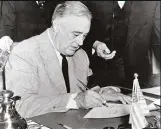  ??  ?? 8 December 1941: The US enters the fray After a unanimous senate vote, and having addressed the nation on the radio, Roosevelt signs the declaratio­n of war against Japan