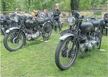  ?? ?? As you might expect, there was a fine showing from the Vincent Owners' Club including on the right, M Symonds’ Vincent HRD Rapide and to the left P Woodbine’s 1950 Comet.