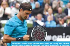  ?? — AFP ?? STUTTGART: Swiss Roger Federer reacts after his victory over German Mischa Zverev at the ATP Mercedes Cup tennis tournament in Stuttgart, southweste­rn Germany, yesterday.
