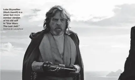  ?? PHOTOS BY LUCASFILM ?? Luke Skywalker (Mark Hamill) is a wiser but more somber version of his old self in “Star Wars: The Last Jedi.”