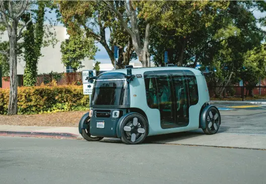  ?? ZOOX INC. ?? Zoox, a self-driving vehicle, takes to the road Feb. 11 in Foster City, California. The robotaxi company owned by Amazon says it has successful­ly carried passengers on public roads.