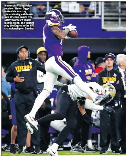  ??  ?? Minnesota Vikings wide receiver Stefon Diggs makes his amazing, game-winning catch over New Orleans Saints free safety Marcus Williams last weekend. The Vikings play the Eagles in the NFC championsh­ip on Sunday.