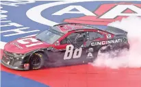  ?? WILL LESTER/ASSOCIATED PRESS ?? Alex Bowman celebrates with a burnout after winning a NASCAR Cup Series race Sunday in Fontana, Calif.