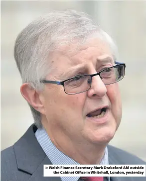  ??  ?? &gt; Welsh Finance Secretary Mark Drakeford AM outside the Cabinet Office in Whitehall, London, yesterday