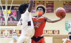  ?? ALLEN CUNNINGHAM/SUN-TIMES ?? Brother Rice, led by Ahmad Henderson, has been streaking.