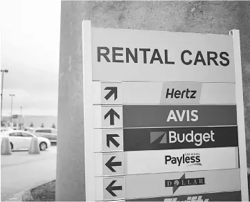  ??  ?? Signs directs travellers towards rental car company locations inside the Louisville Internatio­nal Airport in Louisville, Kentucky, on Feb