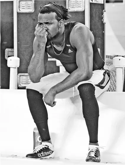  ?? KYLE TERADA, USA TODAY SPORTS ?? Panthers cornerback Josh Norman sits dejected on the sideline after losing Super Bowl 50. Later, he said, “This is going to be with me for a while. ... Gut-wrenching and hard to swallow.”