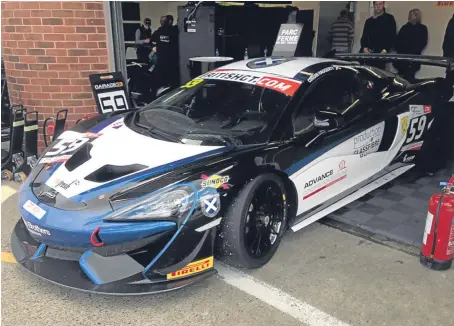  ??  ?? Angus youngster Sandy Mitchell and fellow Scot Ciaran Haggerty gave the new Black Bull Ecurie Ecosse McLaren 570S GT4 its global race baptism and brought the machine home sixth in the GT4 field.