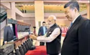  ??  ?? ■ Prime Minister Narendra Modi and Chinese President Xi Jinping visit an exhibition at Hubei Provincial Museum in Wuhan, China, on Friday.