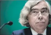  ?? Brendan Smialowski AFP/Getty Images ?? ERNEST MONIZ, secretary of Energy under President Obama, has shown support for renewable gas.