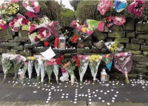  ??  ?? ●●Tributes left for Talaina Hussain at the scene of the crash