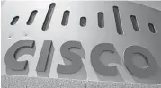  ?? Paul Sakuma / Associated Press file ?? San Jose, Calif.-based Cisco Systems’ shares advanced 2.4 percent on Thursday.