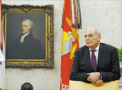  ?? Evan Vucci ?? The Associated Press White House Chief of Staff John Kelly watches Friday as President Donald Trump speaks at a signing ceremony in the Oval Office.