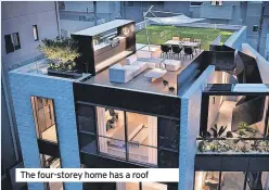  ?? ?? The four-storey home has a roof