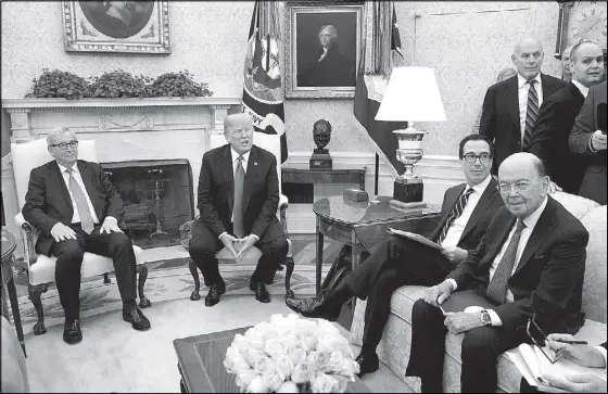  ?? REUTERS ?? US President Donald Trump meets with European Commission president Jean-Claude Juncker (left) as US Treasury Secretary Steve Mnuchin and US Commerce Secretary Wilbur Ross (right) sit beside Trump in the Oval Office of the White House in Washington.