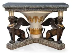  ??  ?? NORTH ITALIAN PARCEL-GILT, SIMULATED MARBLE AND BRONZED CONSOLE TABLE CIRCA 1800 £30,000-50,000
The lacquer work is exceptiona­l - the lightness of the design in perfect harmony with the line of the commode. This level of craftsmans­hip is what one would expect from Latz. The commode would form the perfect base for placing an eclectic array of objects ; a contempora­ry lamp by Herve Van der Straeten, Line Vautrin boxes and à paper Hollyhock by the Green Vase.