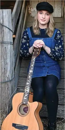  ?? Photo: Contribute­d ?? TELLING STORIES: Highfields singer-songwriter Sophie Volp will make her debut at the Tamworth Country Music Festival at the age of 16.