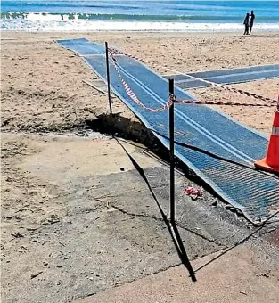  ??  ?? A storm unsettled some sand under the mat at Takapuna Beach on January 6 but it was cordoned off and secured shortly after.