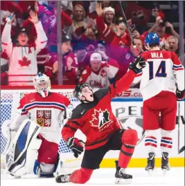  ?? The Canadian Press ?? Canada forward Drake Batherson celebrates after scoring against the Czech Republic during the second period of their semifinal at the IIHF World Junior Championsh­ip in Buffalo, N.Y., on Thursday. Canada won 7-2.