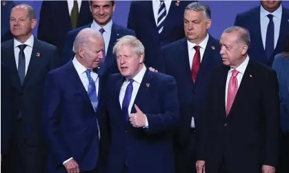  ?? Photograph: Denis Doyle/Getty ?? Boris Johnson, centre, with US president Joe Biden (left) and Turkish president Recep Tayyip Erdoğan (right) at the Nato summit in Madrid on Wednesday.