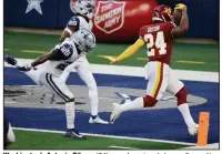  ?? (AP/Ron Jenkins) ?? Washington’s Antonio Gibson (24) runs for a touchdown after getting past Dallas Cowboys safety Xavier Woods (25) and cornerback Rashard Robinson during the first half Thursday in Arlington, Texas. Gibson ran for 115 yards and three touchdowns in Washington’s 41-16 victory.