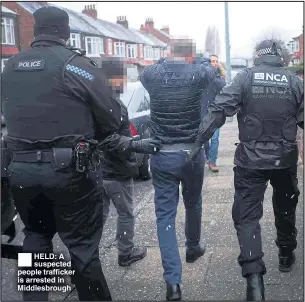  ??  ?? ®Ê HELD: A suspected people trafficker is arrested in Middlesbro­ugh