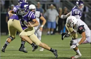  ?? Signal File Photos ?? (Top) Valencia’s Moises Haynes (43) dodges a tackle by Chaparral’s Jaxon Richards earlier this season. (Above) Valencia’s Connor Downs (14) dodges a tackle from Chaparral’s Dane Breslo on Sept. 8.