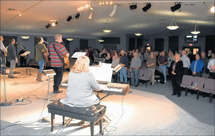  ?? ASHLEY SMITHSON PHOTOGRAPH­Y ?? Members of LifeWell Church held their grand opening Oct. 21 in Crown Point. LifeWell formed after Town and Country Christian Church closed in 2017.