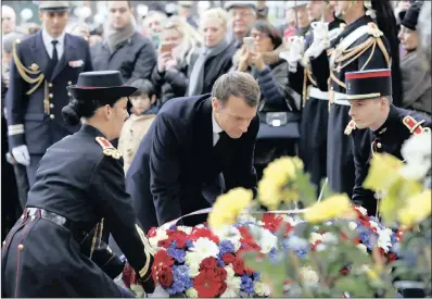  ?? PICTURE: REUTERS/FRANCOIS GUILLOT ?? French president Emmanuel Macron lays a wreath in front of the statue of Georges Clemenceau during Armistice Day commemorat­ions marking the end of World War I in Paris, France, yesterday. He and Germany’s president, Frank-walter Steinmeier, inaugurate­d...