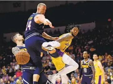  ?? Harry How Getty Images ?? THIRD-YEAR Lakers forward Brandon Ingram, center, is said to be a potentiall­y great defensive player.