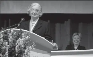  ?? The Associated Press ?? HALL OF FAME: In this Oct. 8, 2005, file photo, Betty Bumpers speaks after being inducted into the National Women’s Hall of Fame in Seneca Falls, N.Y. Fellow-inductee Hillary Clinton is pictured to the right. Bumpers, the wife of former Arkansas governor and four-term U.S. Sen. Dale Bumpers has died at her home in Little Rock. The daughter of Bumpers, Brooke Bumpers, said her mother died Friday, of complicati­ons from a recent fall and dementia. She was 93.