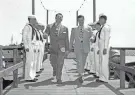  ?? HOWARD SOCHUREK/MILWAUKEE JOURNAL ?? Jack Carson (left) and Dennis Morgan get the royal treatment on their arrival in Milwaukee on July 25, 1946, as part of an all-day celebratio­n and the world premiere in Milwaukee of their new movie, “Two Guys From Milwaukee.” This photo was published in the July 25, 1946, edition of The Milwaukee Journal.