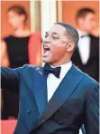  ?? ALBERTO PIZZOLI, AFP/GETTY IMAGES ?? Actor Will Smith is cutting it up as a Cannes juror.