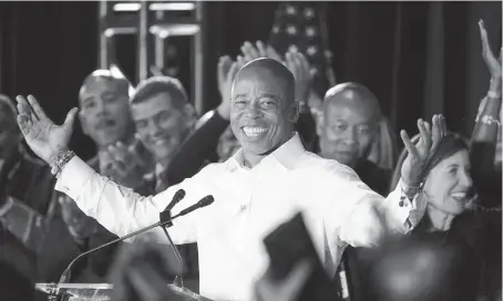  ?? FRANK FRANKLIN II/AP ?? New York City Mayor-elect Eric Adams acknowledg­es supporters following his election win as the city’s next mayor Tuesday in New York.